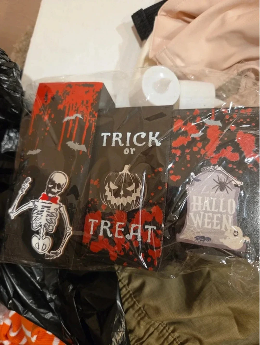 Trick or treat candle holder with flameless candles